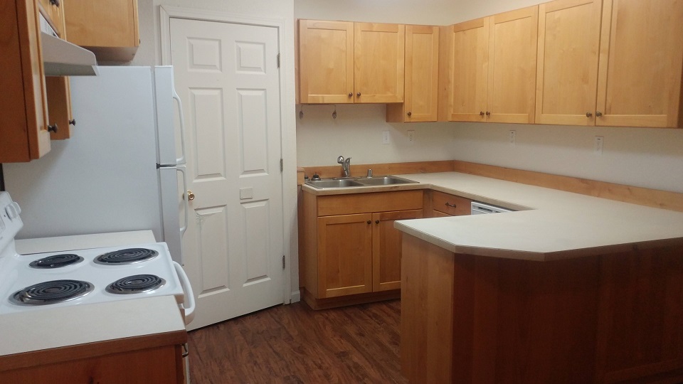 211 11th Ave W, Polson Caras Property Management Co.